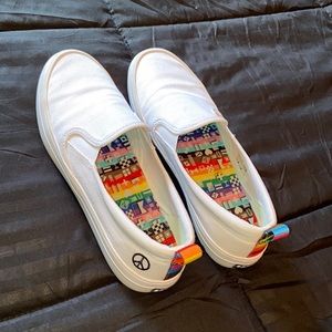 Sperry slip on sneakers with rainbow bottom. Still in box